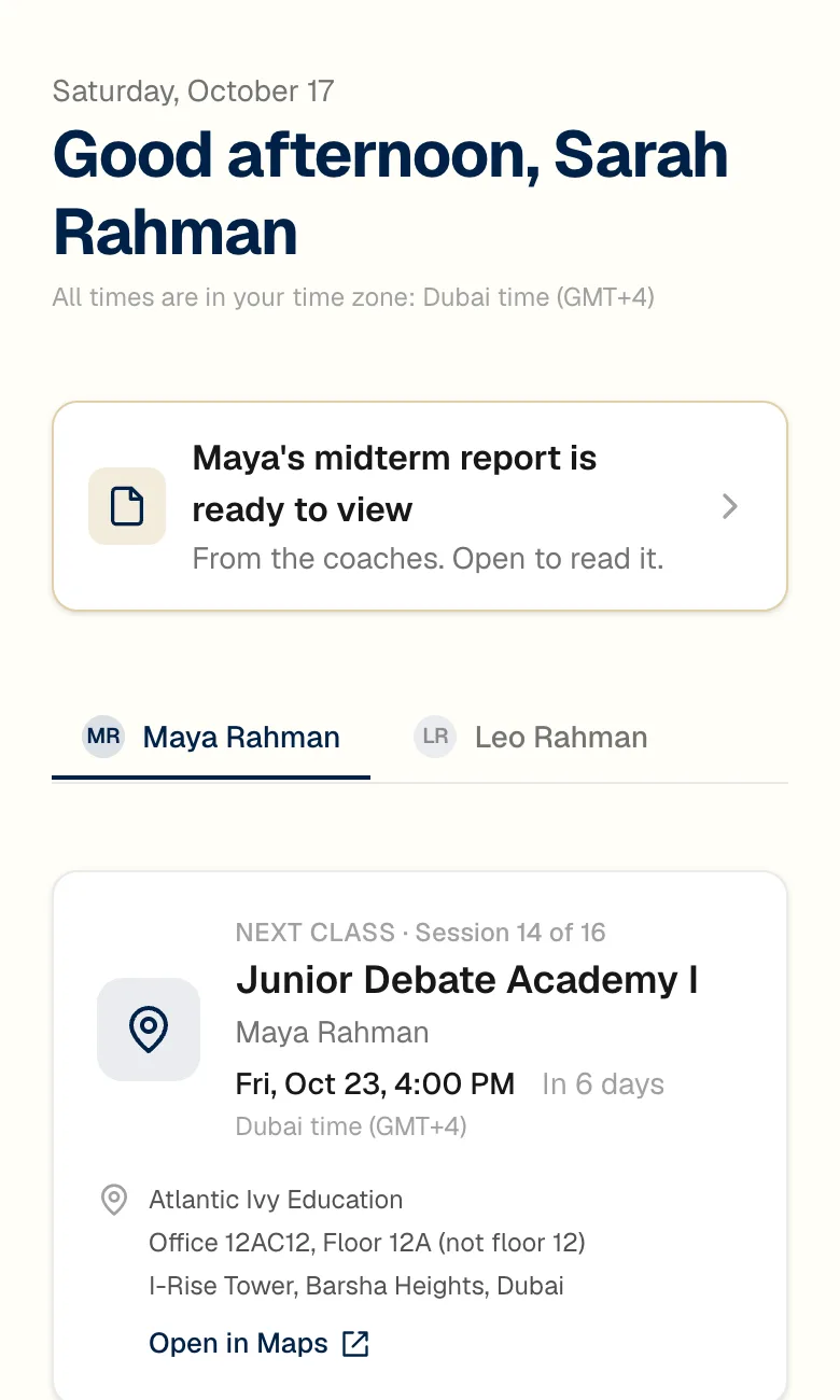 ClassDesk dashboard on a phone: the greeting, a notice that the midterm report is ready, the two children as tabs, and the next in-person class on Friday at 4 PM Dubai time with the venue address